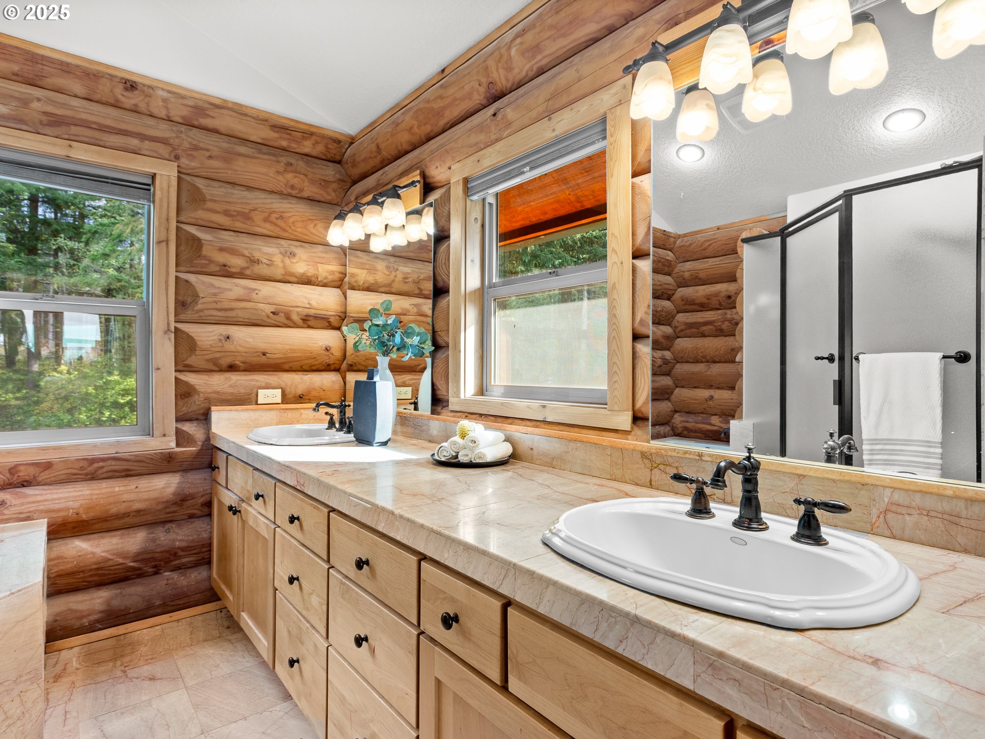 25520 Northeast 58th Street Vancouver, WA 98682 - Photo 26 of 48 a bathroom with double vanity and a mirror