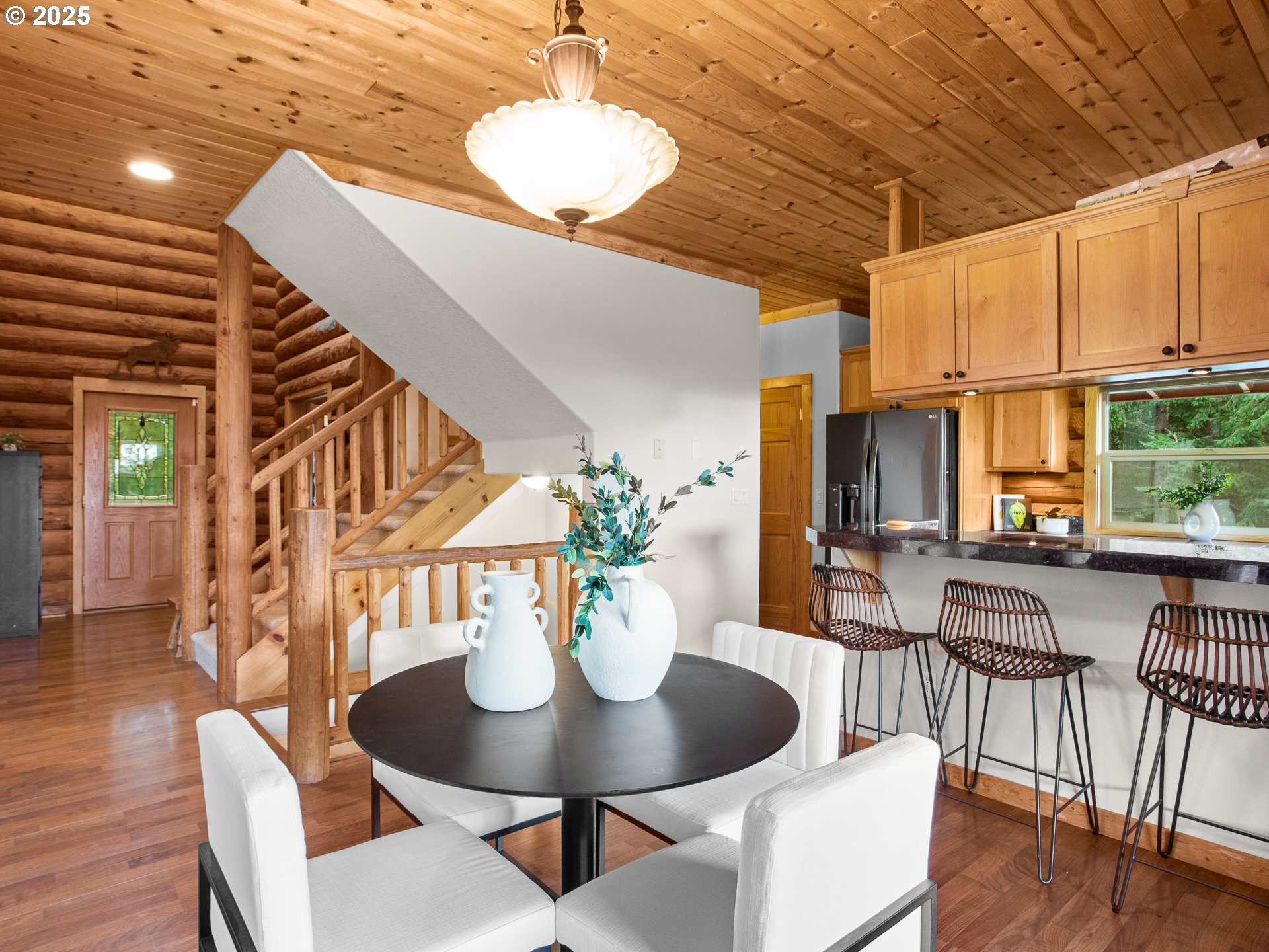 25520 Northeast 58th Street Vancouver, WA 98682 - Photo 7 of 48 a view of a dining room with furniture window and wooden floor