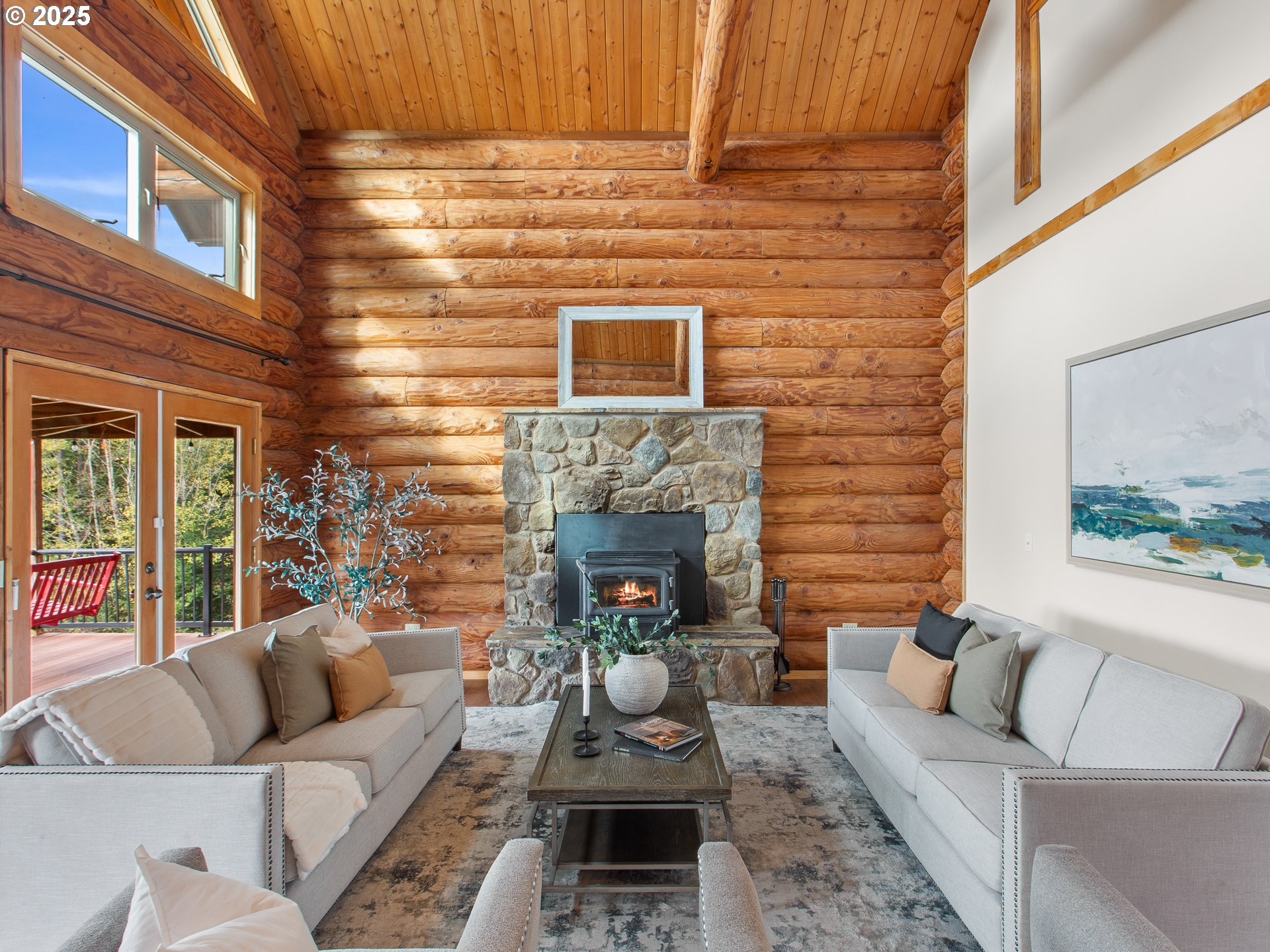 25520 Northeast 58th Street Vancouver, WA 98682 - Photo 10 of 48 a living room with furniture and a fireplace