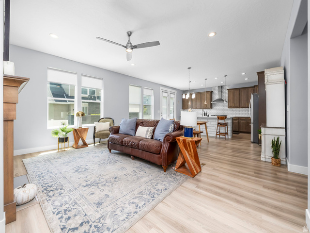 877 South Yarrow Drive Mapleton, UT 84664 - Photo 4 of 46 Open-concept living space featuring wood-finish flooring, recessed lighting, and a ceiling fan