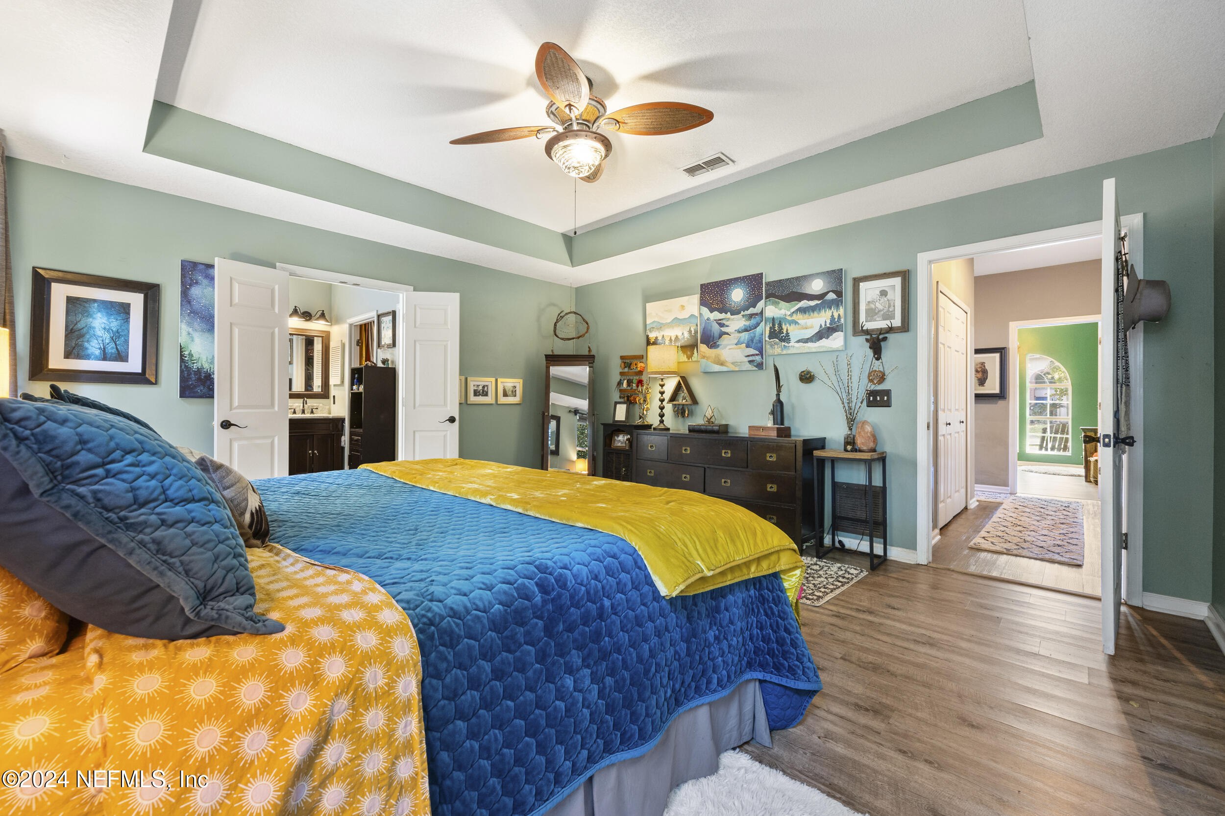 2338 Eagles Nest Road Jacksonville, FL 32246 - Photo 21 of 68 a bed room with a bed and a walk in closet