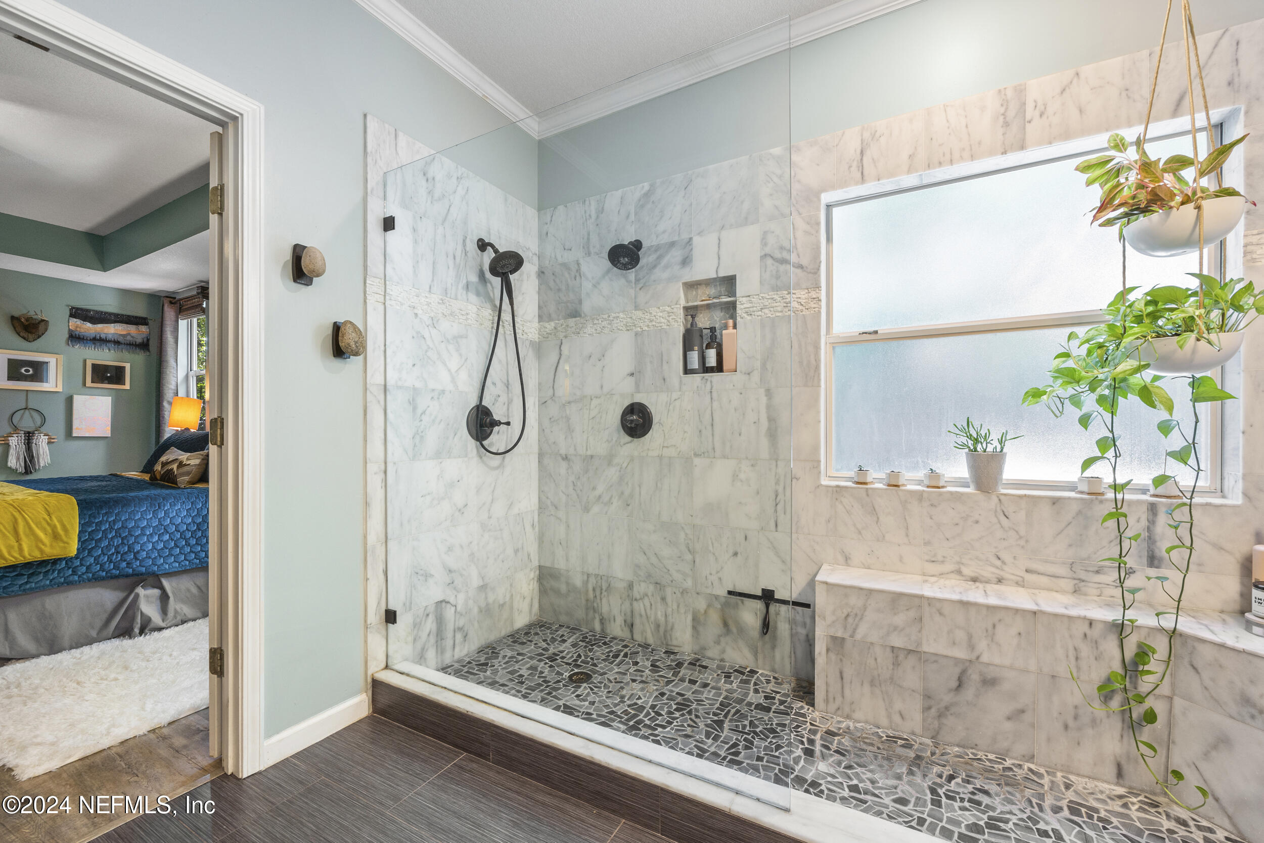 2338 Eagles Nest Road Jacksonville, FL 32246 - Photo 24 of 68 a bathroom with a granite countertop shower