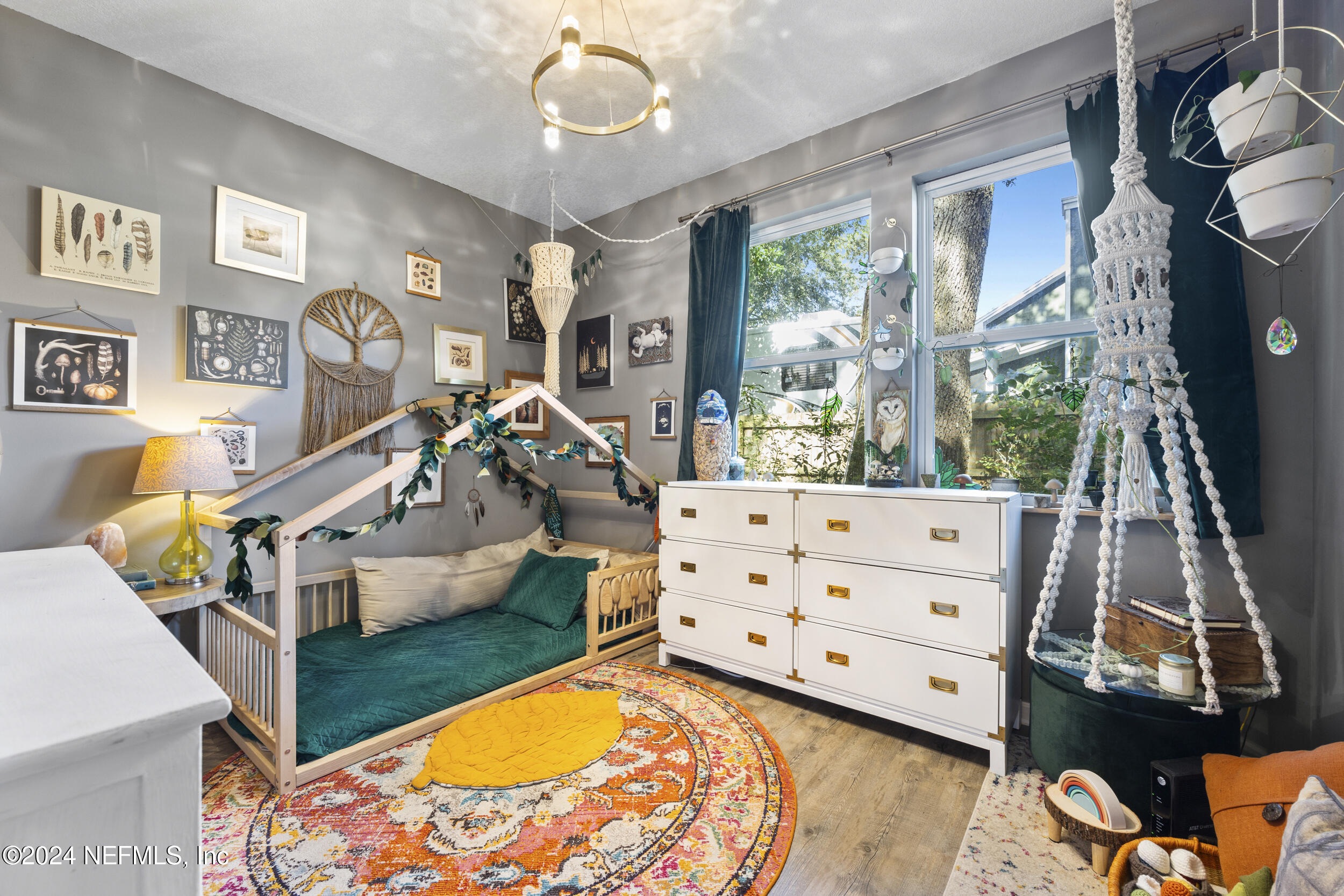 2338 Eagles Nest Road Jacksonville, FL 32246 - Photo 27 of 68 a living room with furniture and a flat screen tv