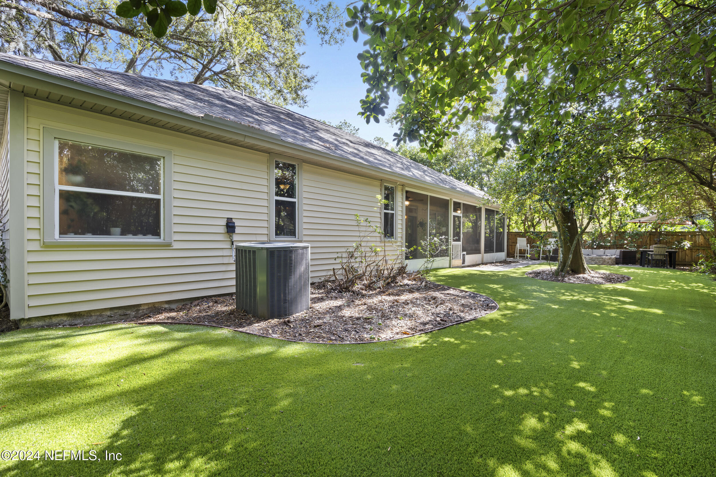 2338 Eagles Nest Road Jacksonville, FL 32246 - Photo 45 of 68 a view of a house with a yard