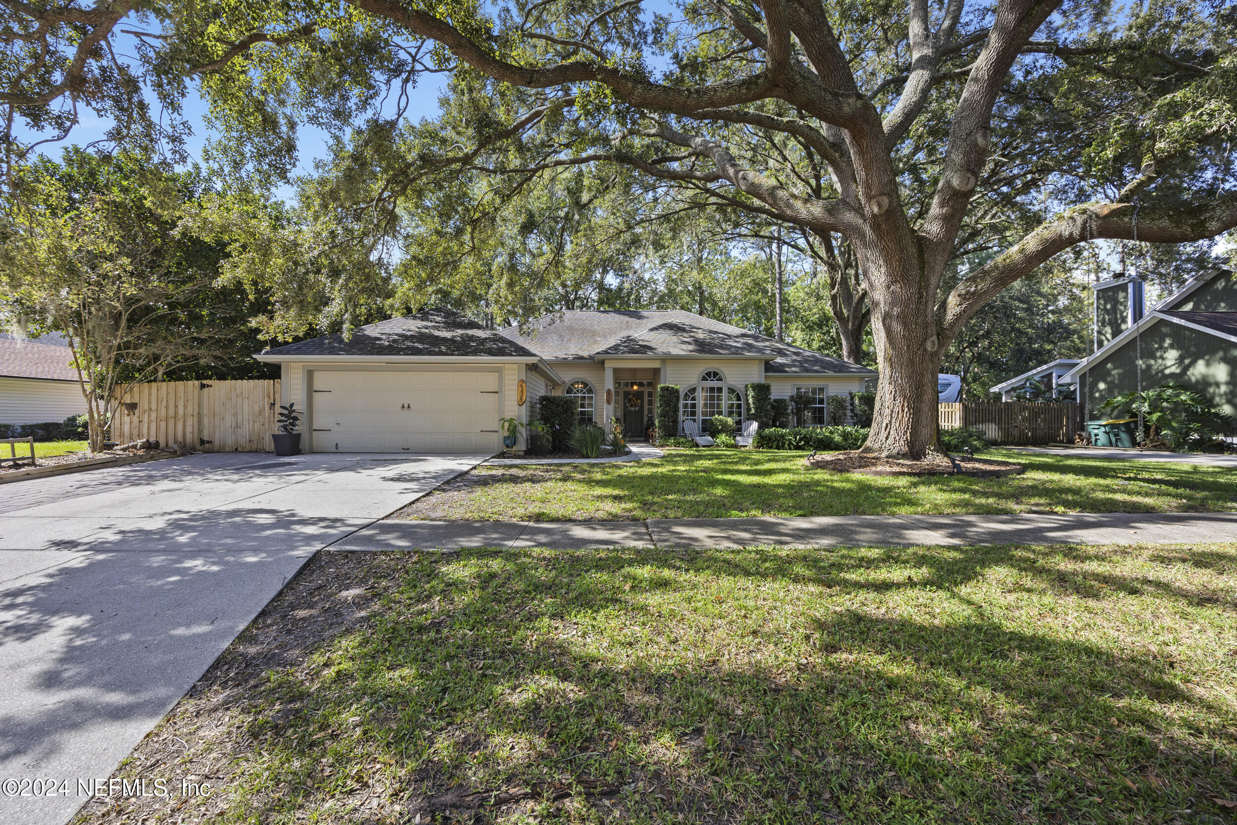 2338 Eagles Nest Road Jacksonville, FL 32246 - Photo 49 of 68 a view of a house with a yard
