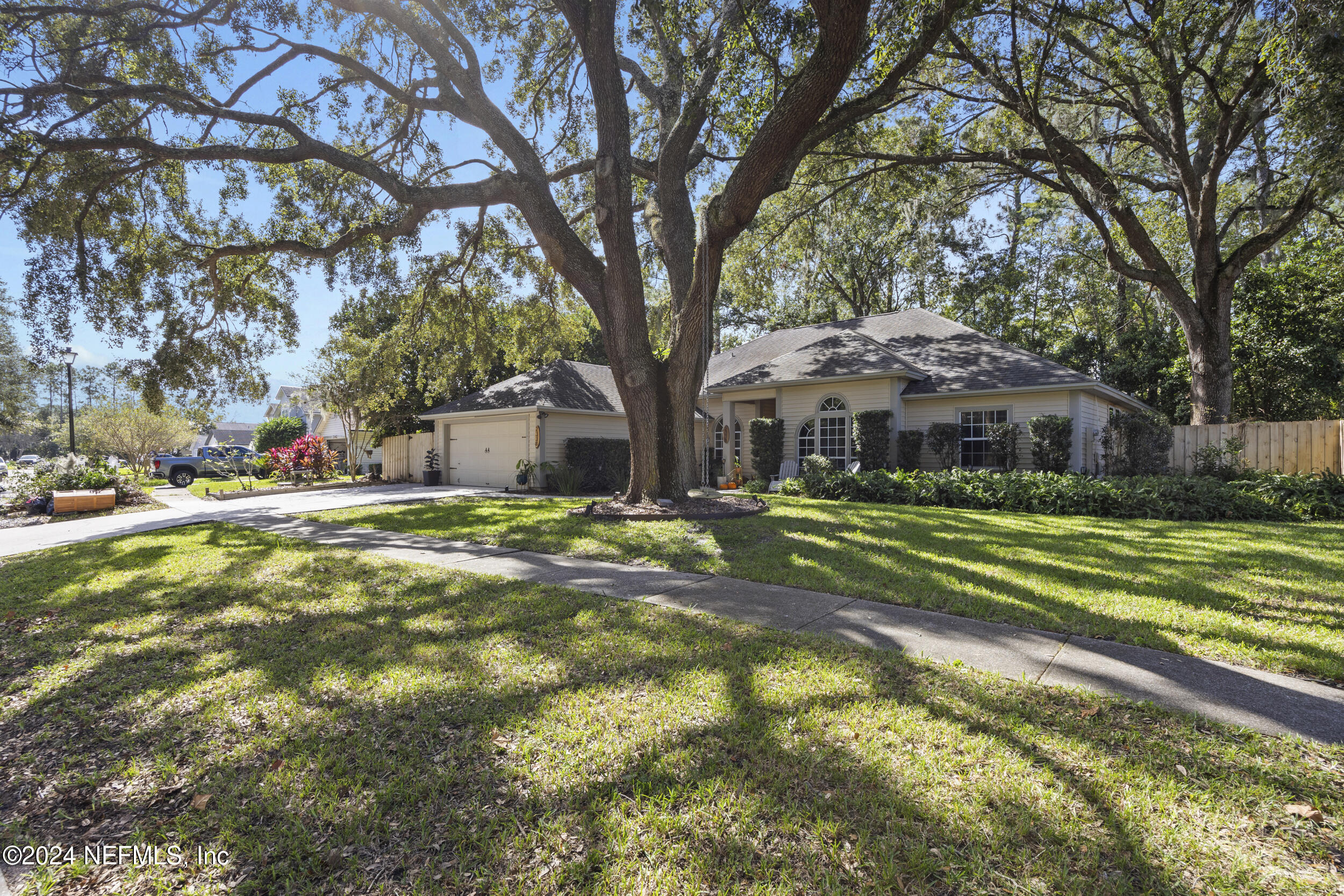 2338 Eagles Nest Road Jacksonville, FL 32246 - Photo 50 of 68 a view of a house with a yard