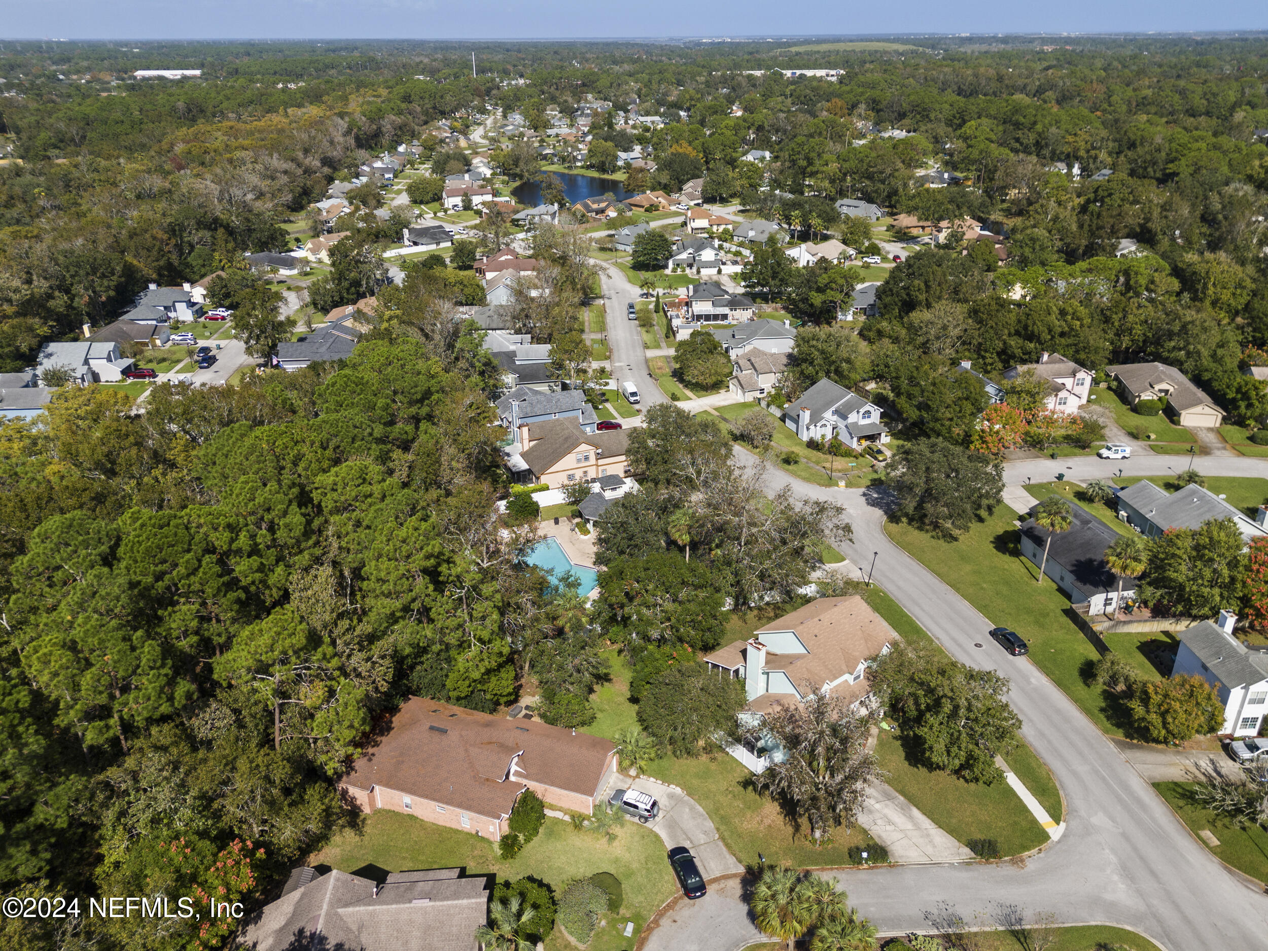 2338 Eagles Nest Road Jacksonville, FL 32246 - Photo 61 of 68 an aerial view of residential houses with outdoor space