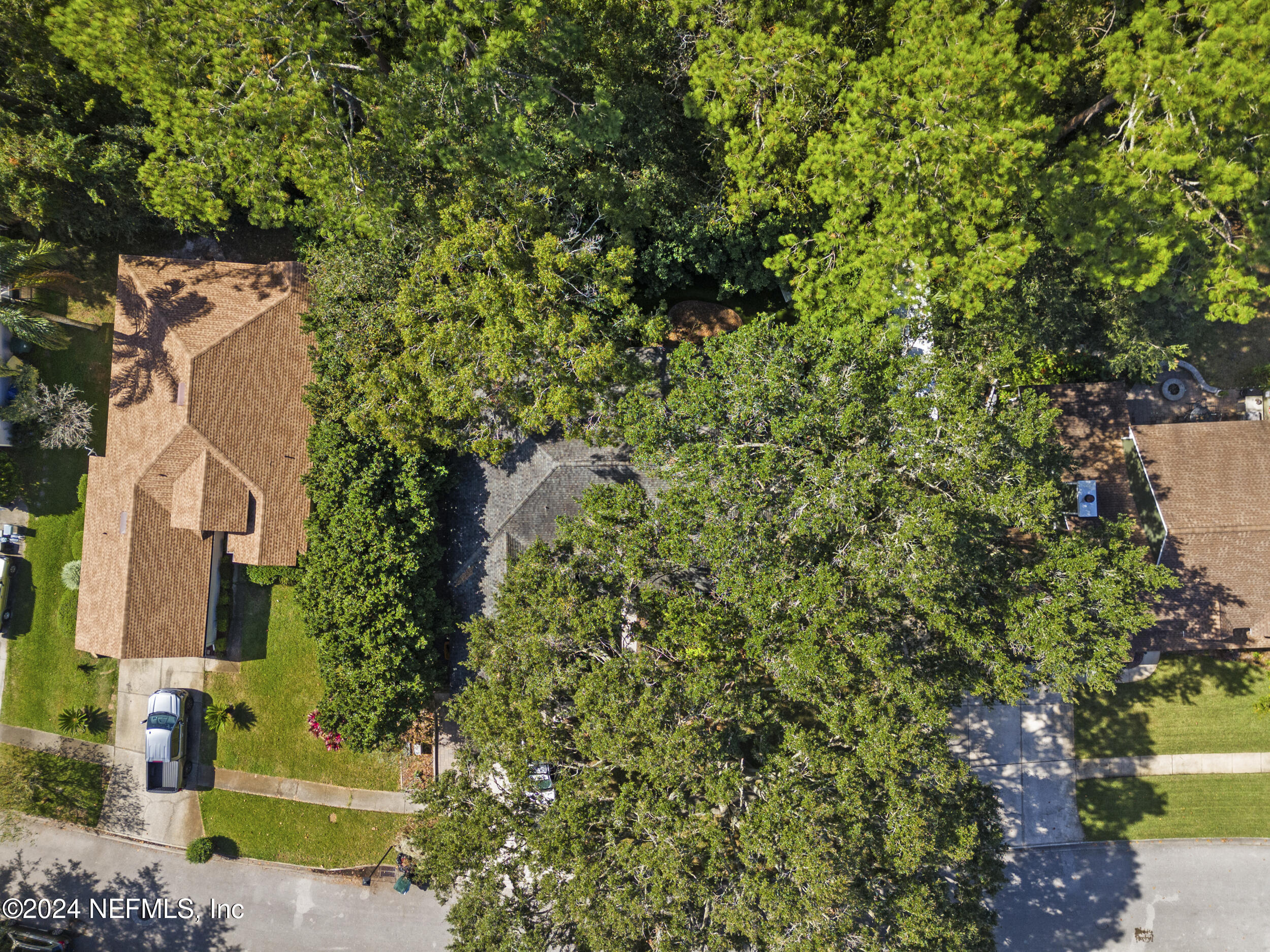 2338 Eagles Nest Road Jacksonville, FL 32246 - Photo 67 of 68 an aerial view of a house with a yard fountain and outdoor seating