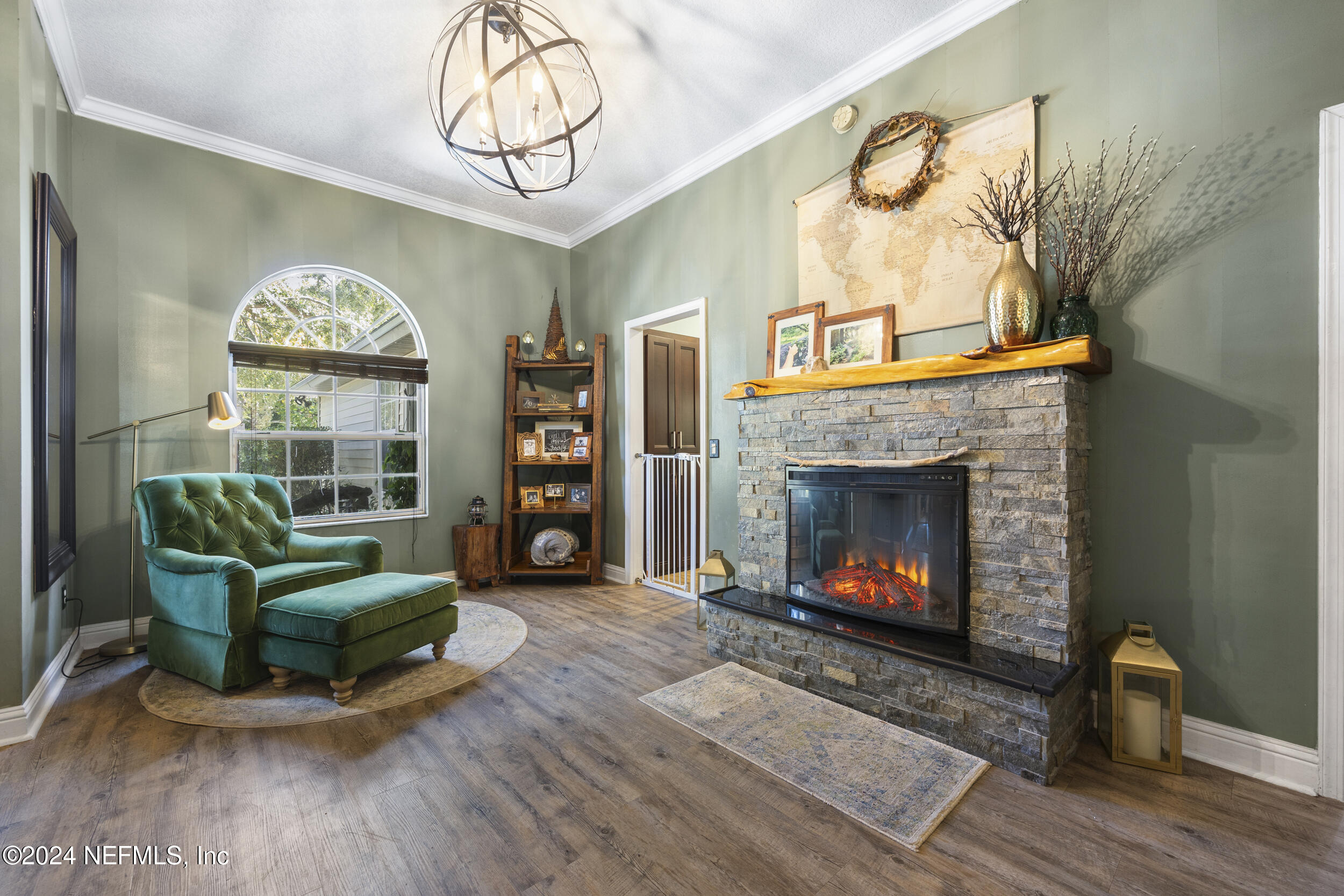 2338 Eagles Nest Road Jacksonville, FL 32246 - Photo 7 of 68 a living room with furniture and a fireplace