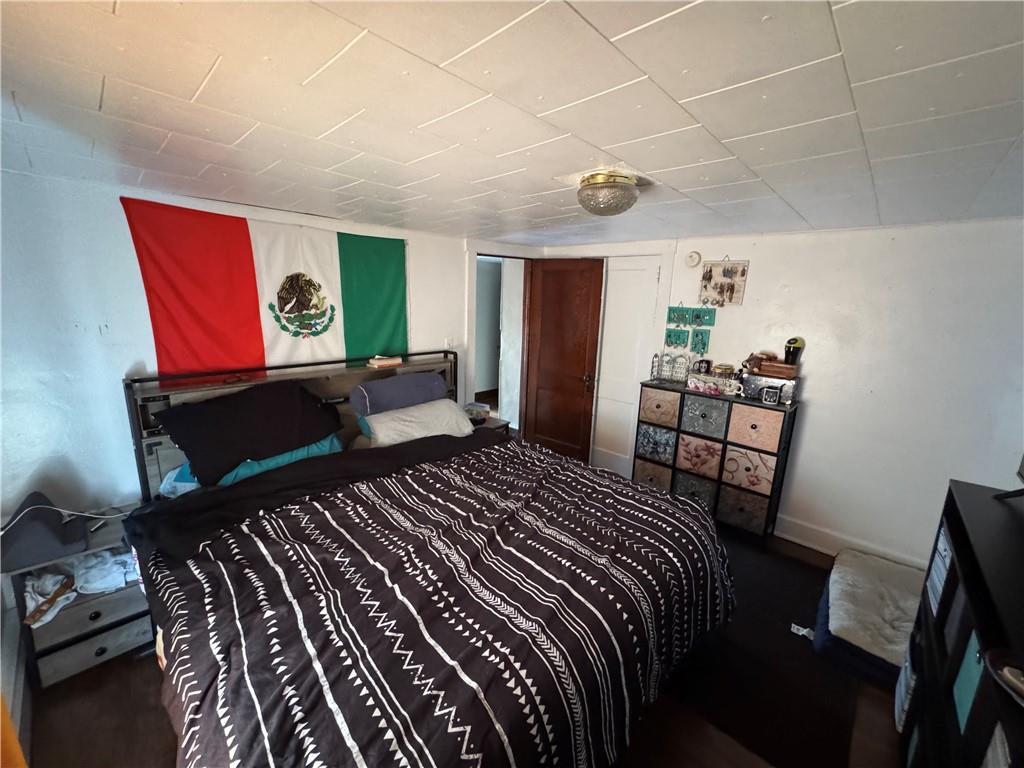 1354 Water Street Indiana, PA 15701 - Photo 17 of 28 a bedroom with a bed and wooden floor