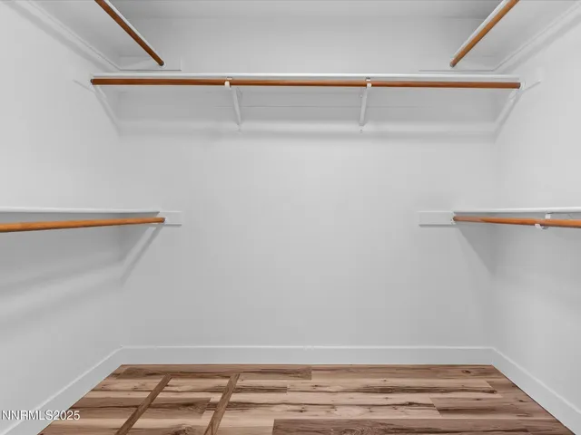 a view of a room with racks on the wall