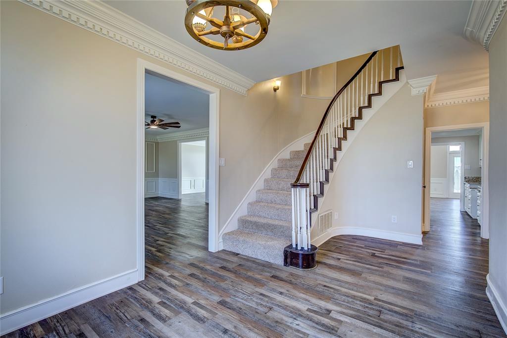 7359 Highway 154 Sulphur Springs, TX 75482 - Photo 9 of 40 Grand entry foyer with curved wall and staircase, extensive dentil molding