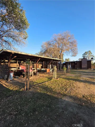 a view of a patio with a table chairs and a patio