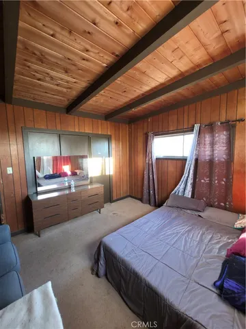 a view of yard with wooden fence