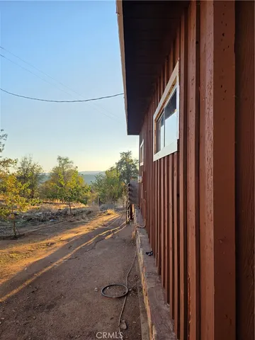 a view of a street with a building in the background