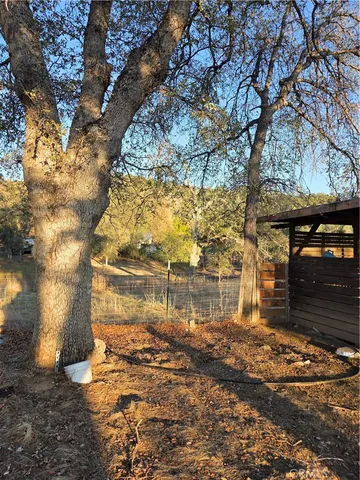 a view of a backyard of a house