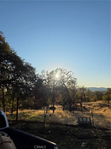 a view of a town with mountains in the background