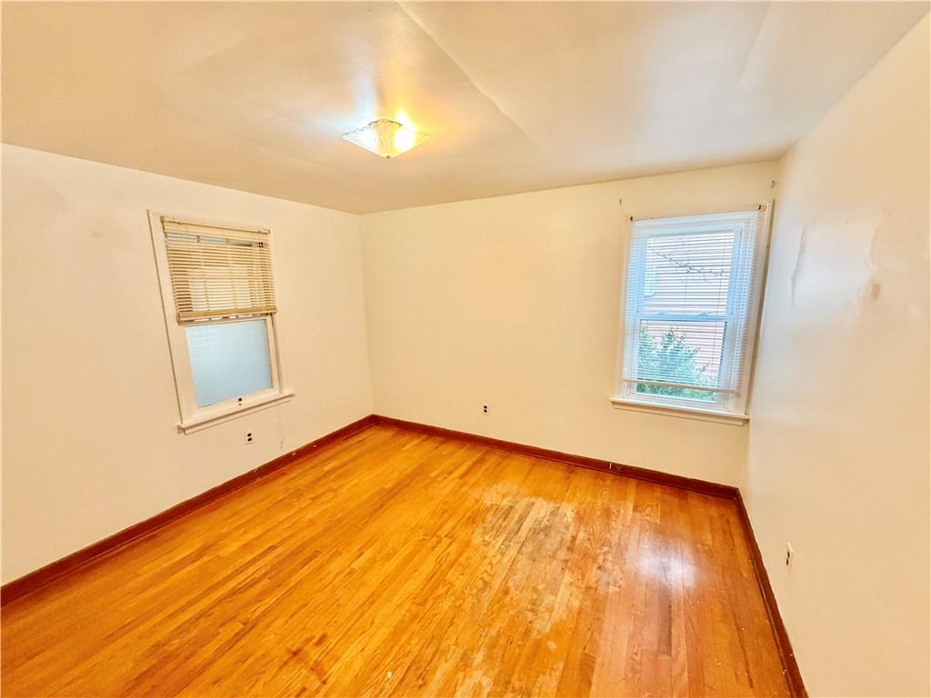 37 Kay Street Uniontown, PA 15401 - Photo 12 of 14 a view of an empty room with wooden floor and a window
