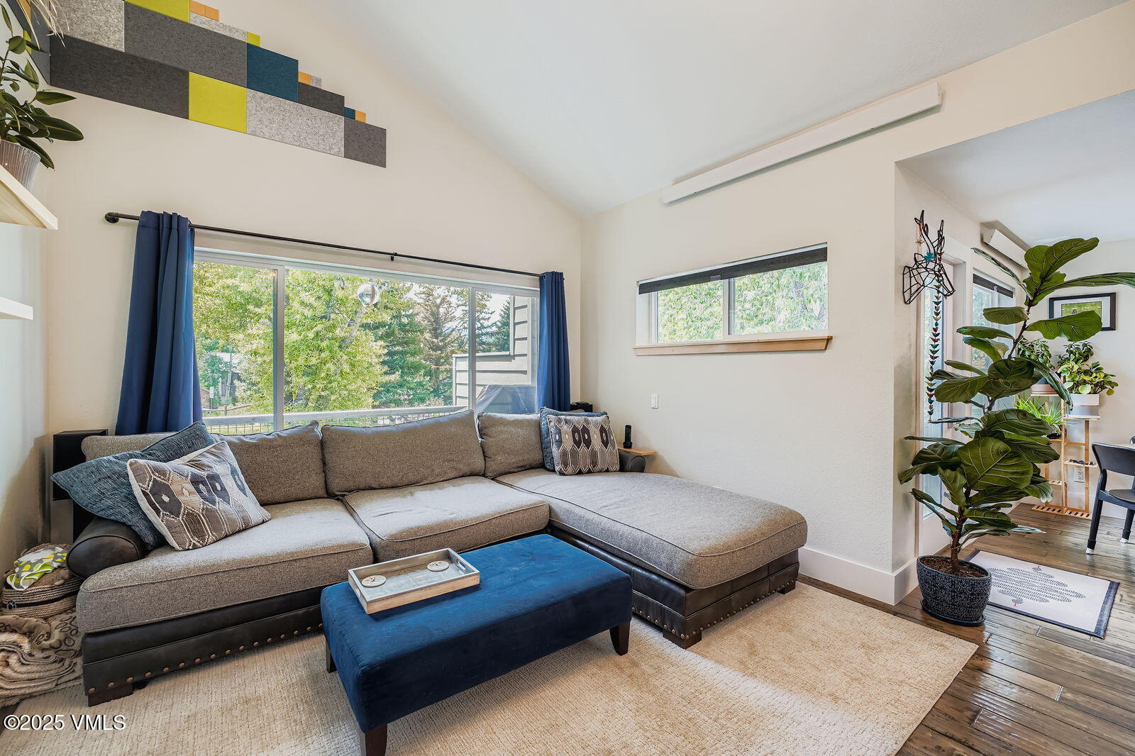 22 Wellington Lane, Unit 2 Edwards, CO 81632 - Photo 13 of 32 a living room with furniture and a large window