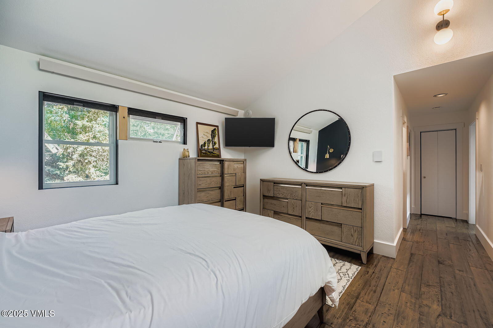 22 Wellington Lane, Unit 2 Edwards, CO 81632 - Photo 16 of 32 a bedroom with a bed and a dresser