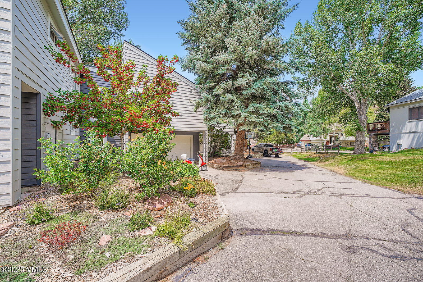 22 Wellington Lane, Unit 2 Edwards, CO 81632 - Photo 2 of 32 a view of a building with garden and pathway