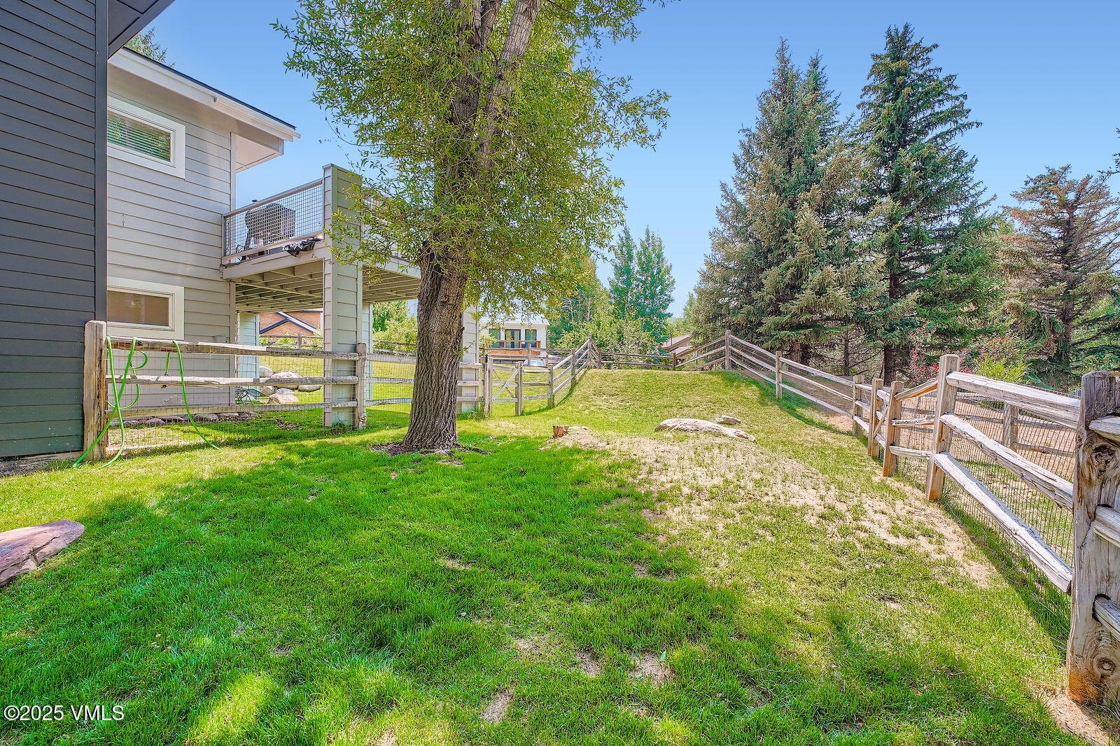 22 Wellington Lane, Unit 2 Edwards, CO 81632 - Photo 23 of 32 a view of a swimming pool with a house in the background