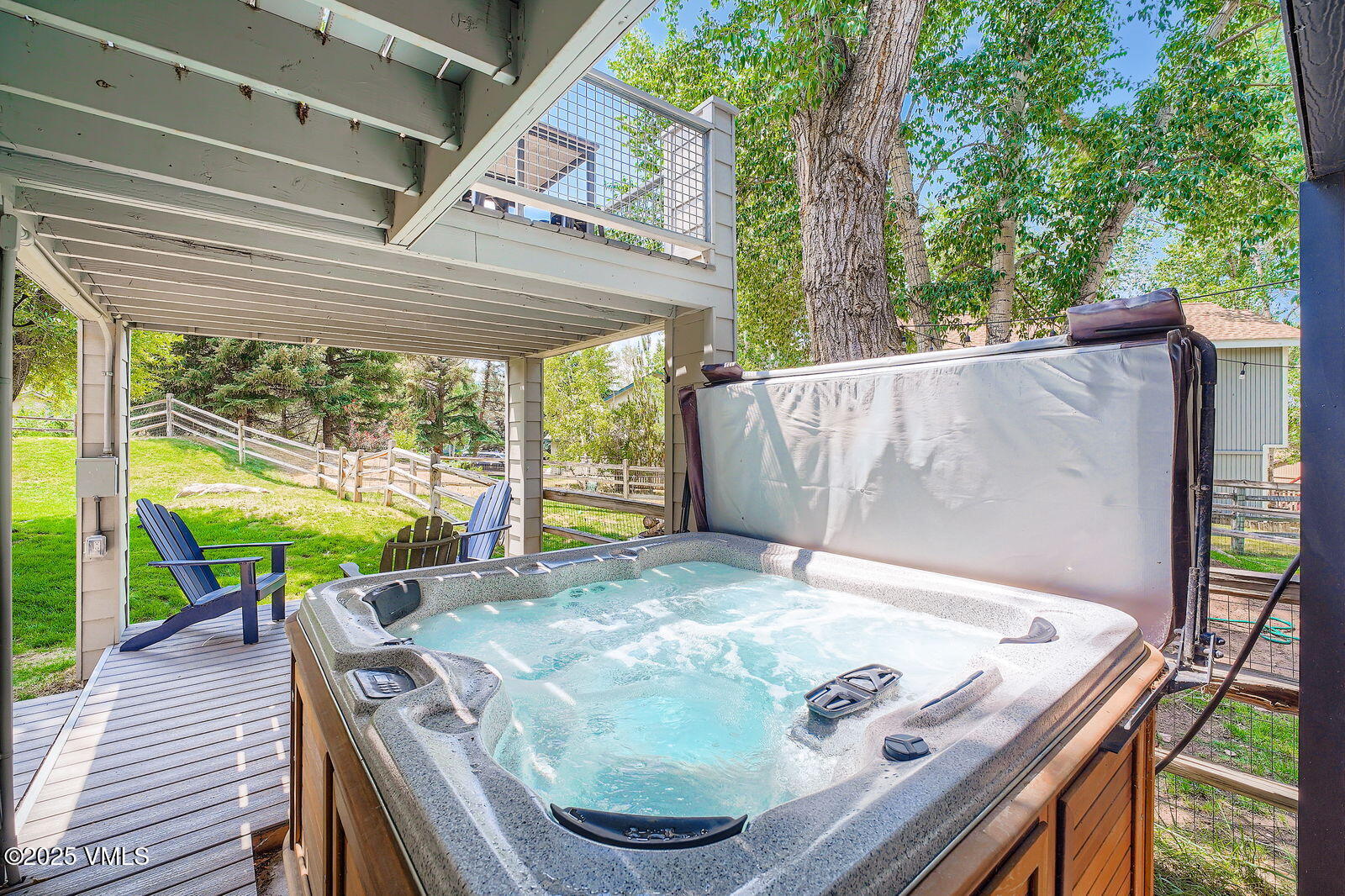 22 Wellington Lane, Unit 2 Edwards, CO 81632 - Photo 25 of 32 a view of a roof deck with table and chairs with wooden floor and fence