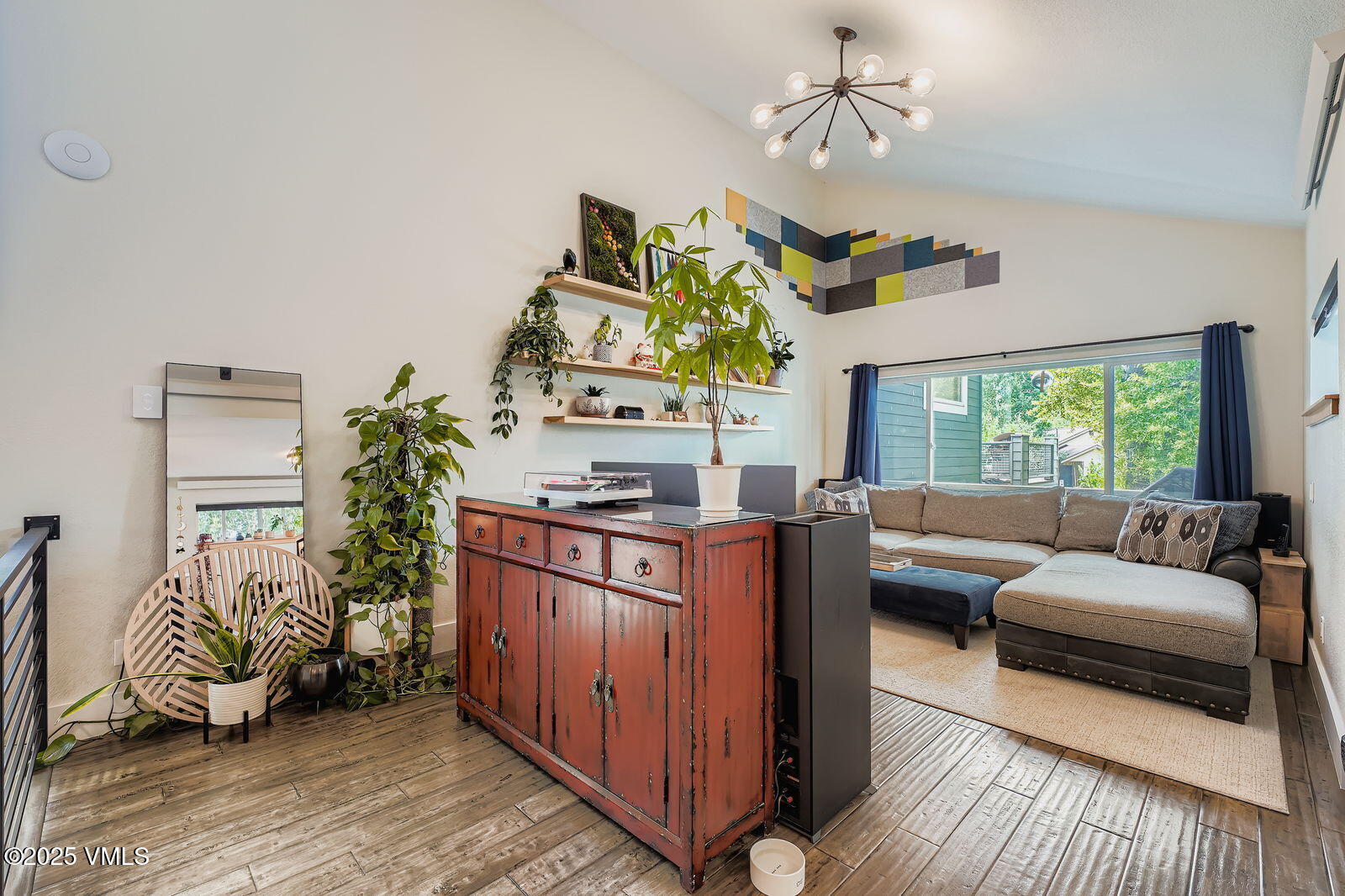 22 Wellington Lane, Unit 2 Edwards, CO 81632 - Photo 27 of 32 a living room with furniture and a large window
