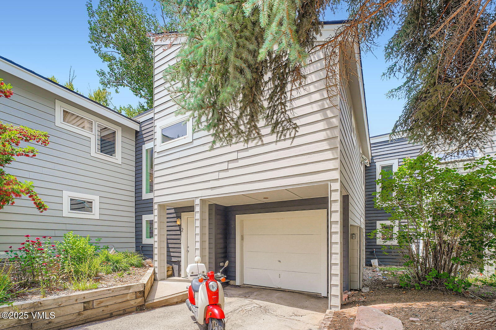 22 Wellington Lane, Unit 2 Edwards, CO 81632 - Photo 29 of 32 a view of a house with a yard