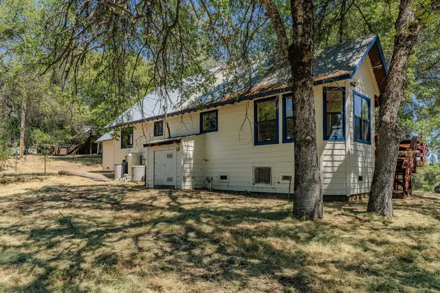 a view of a yard with a lake view