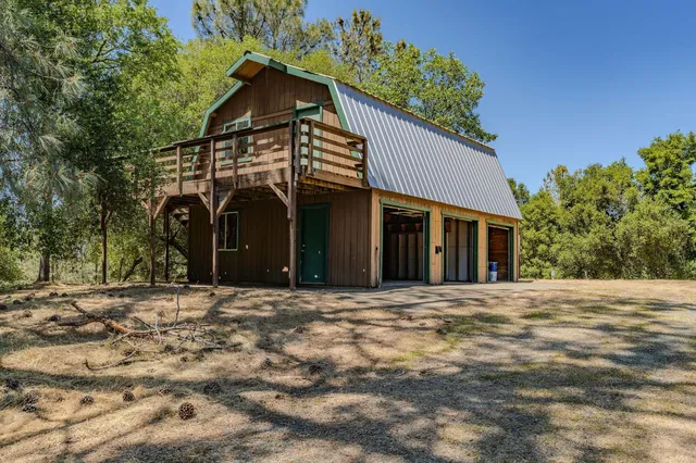 a bathroom with a shower and a sink