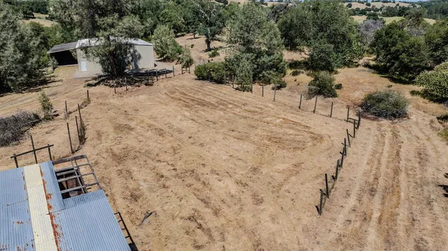 a kitchen with stainless steel appliances granite countertop a stove and a microwave