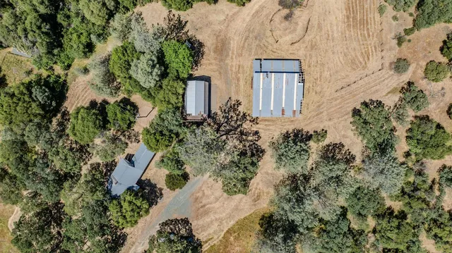 a view of a bench in a backyard