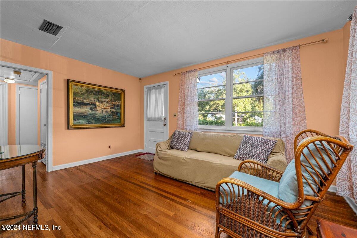 6554 Ortolan Avenue Jacksonville, FL 32216 - Photo 13 of 30 a living room with furniture and a window