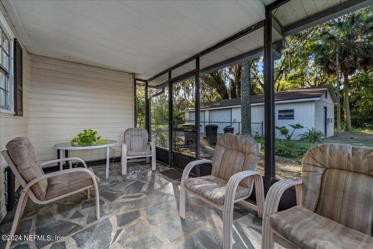 6554 Ortolan Avenue Jacksonville, FL 32216 - Photo 29 of 30 a outdoor living space with furniture