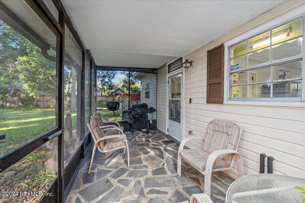 6554 Ortolan Avenue Jacksonville, FL 32216 - Photo 30 of 30 a view of an outdoor space with seating area