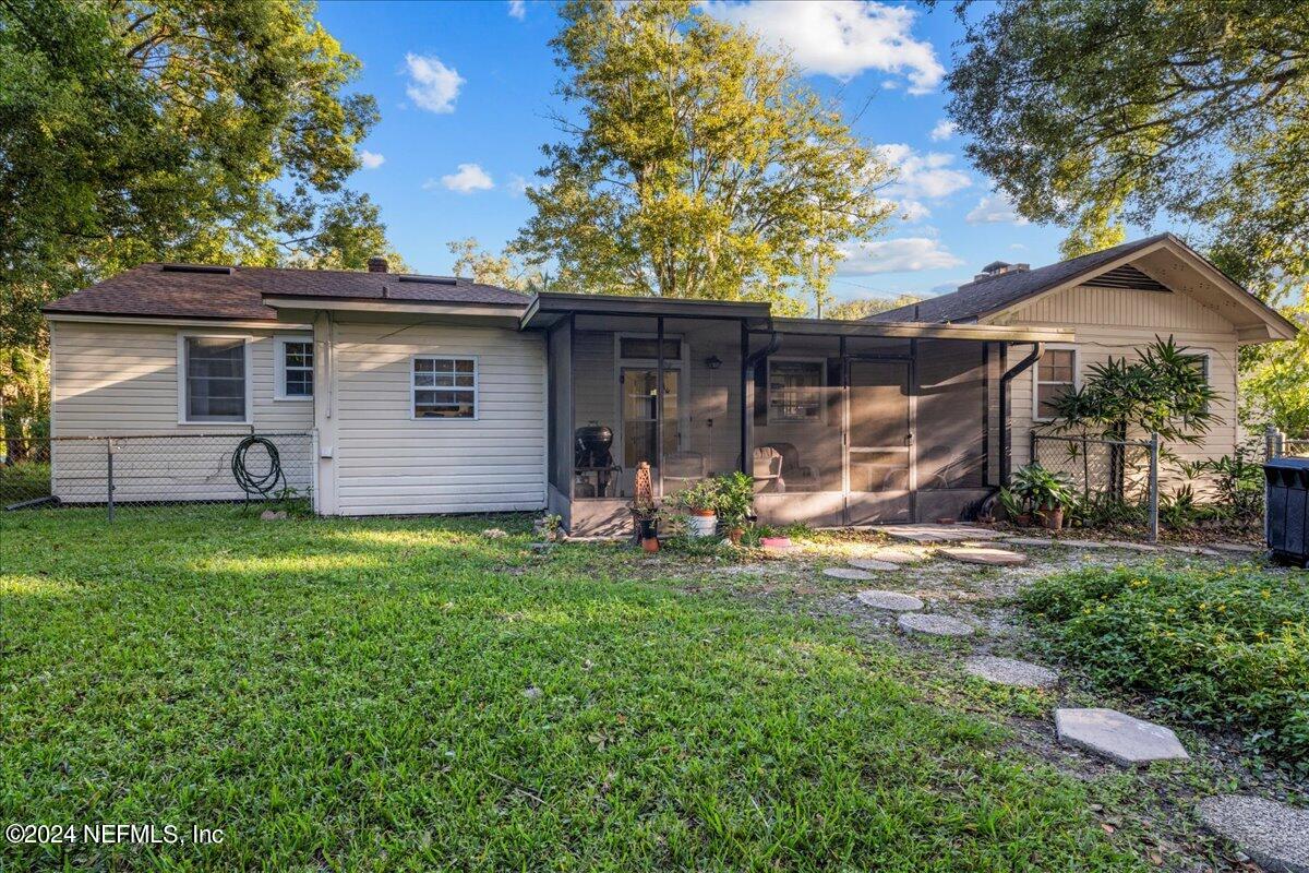6554 Ortolan Avenue Jacksonville, FL 32216 - Photo 5 of 30 a view of a house with backyard and sitting area