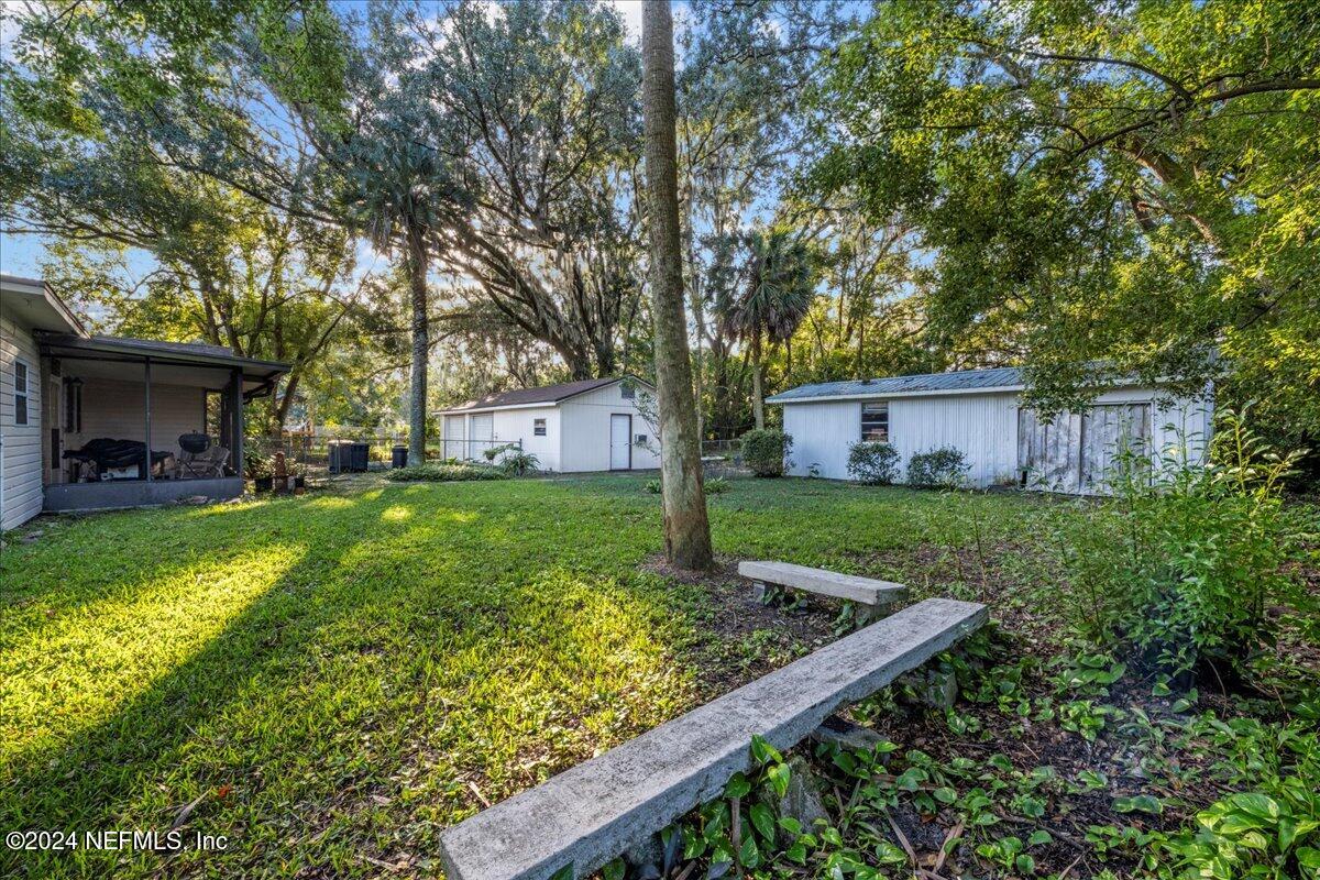 6554 Ortolan Avenue Jacksonville, FL 32216 - Photo 7 of 30 a view of house with backyard