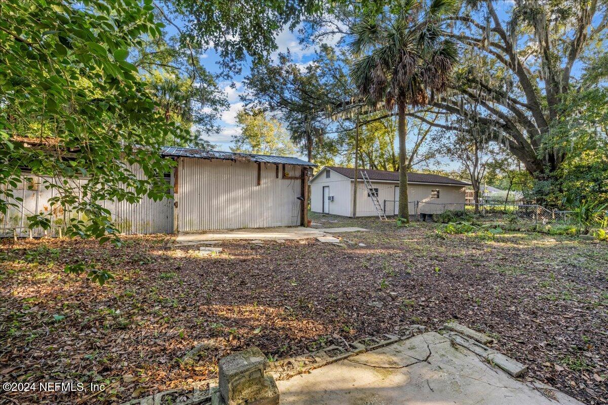 6554 Ortolan Avenue Jacksonville, FL 32216 - Photo 9 of 30 a house with trees in front of it