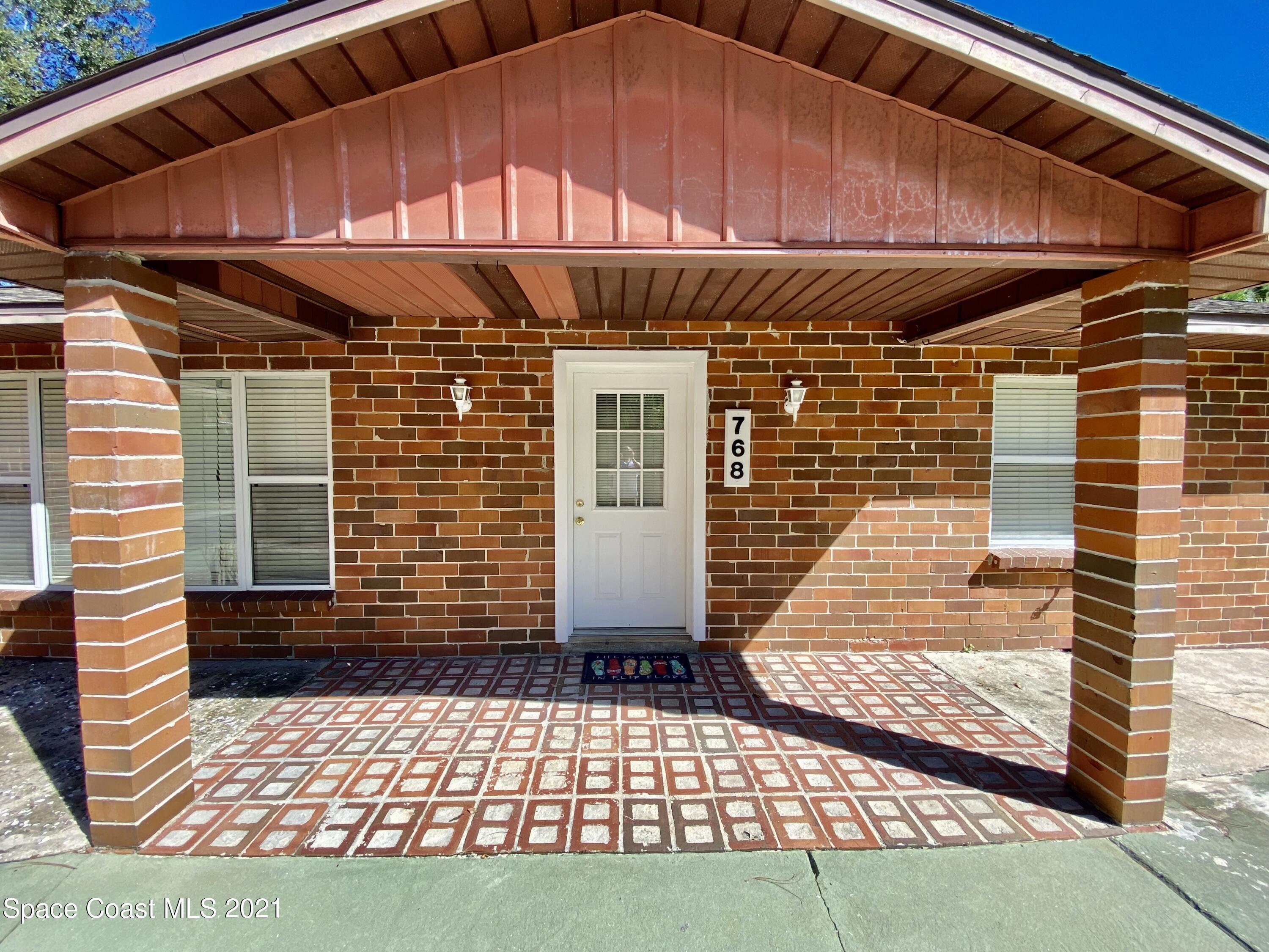768 Buffalo Road Titusville, FL 32796 - Photo 3 of 34 2791CB95-C3AC-48AB-B24B-2D58280473FC
