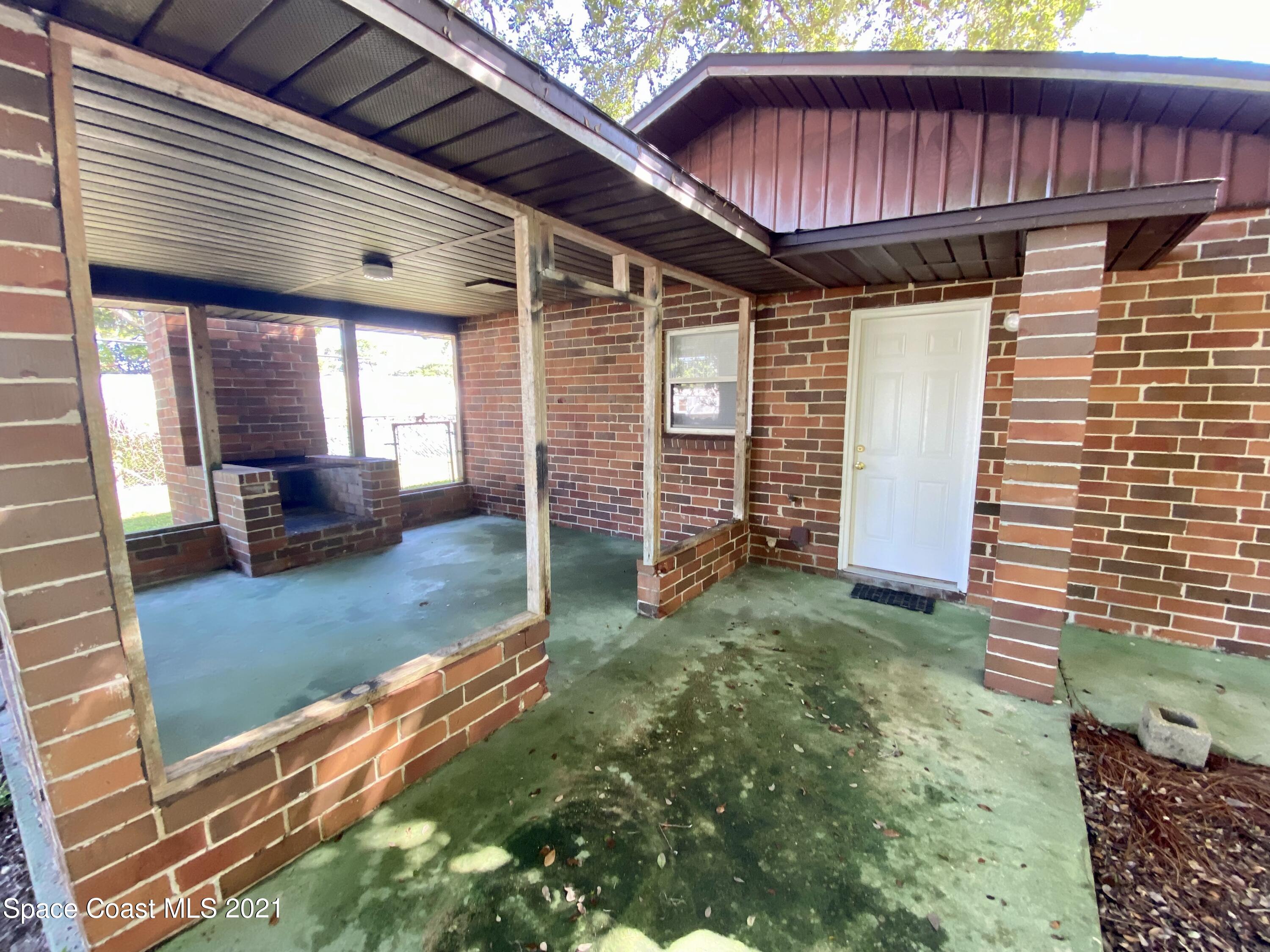 768 Buffalo Road Titusville, FL 32796 - Photo 4 of 34 5BFCFF38-9DCE-4388-8D66-BFD7D2D75E9D