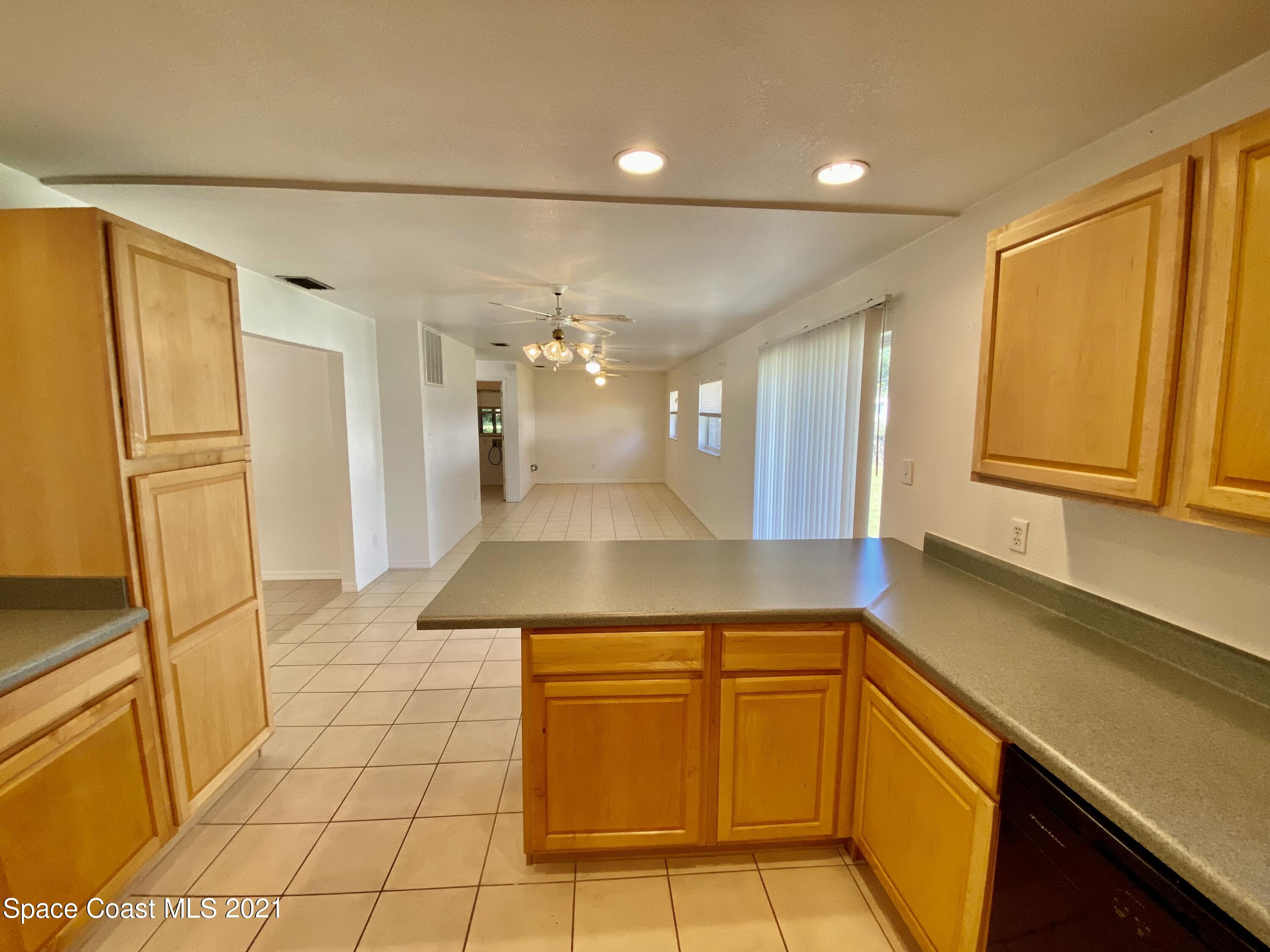 768 Buffalo Road Titusville, FL 32796 - Photo 9 of 34 92CBA4BD-1D41-4FCC-82B3-FF4CA48A750F