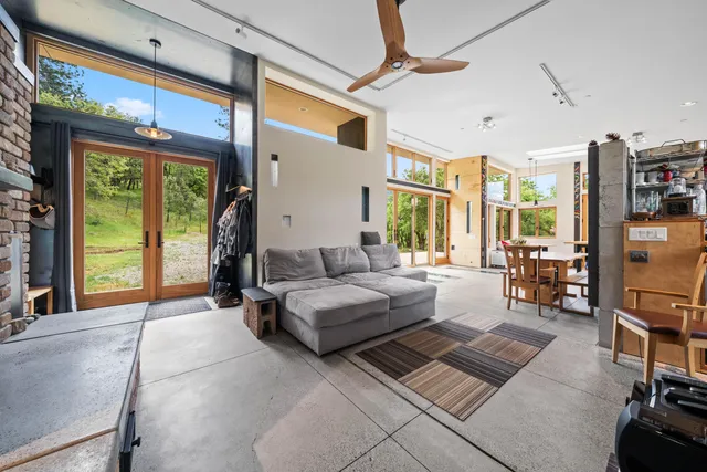 a kitchen with stainless steel appliances granite countertop a stove and a sink