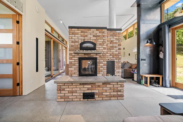 a kitchen with a sink and a large window