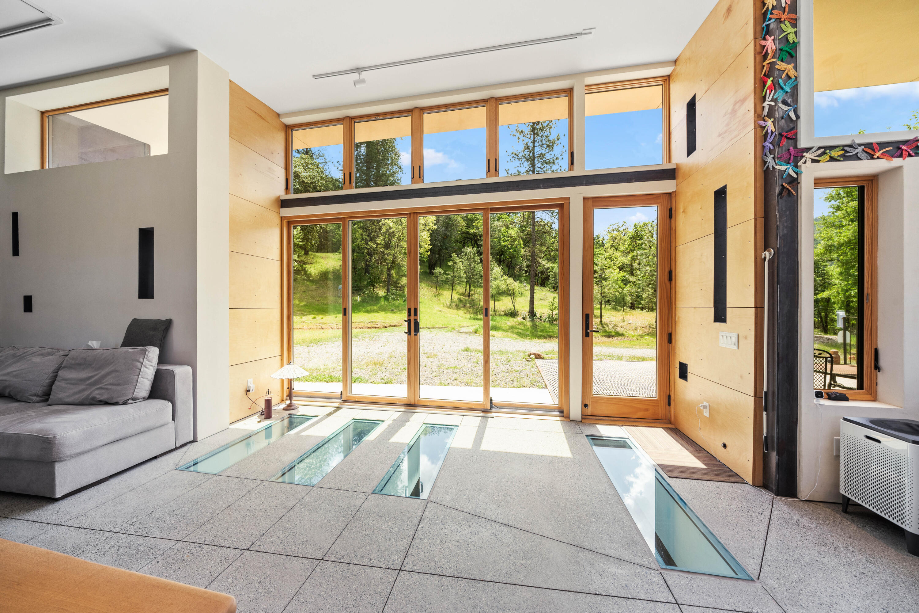 6691 Reading Creek Road Douglas City, CA 96024 - Photo 18 of 125 a living room filled with furniture and a large window