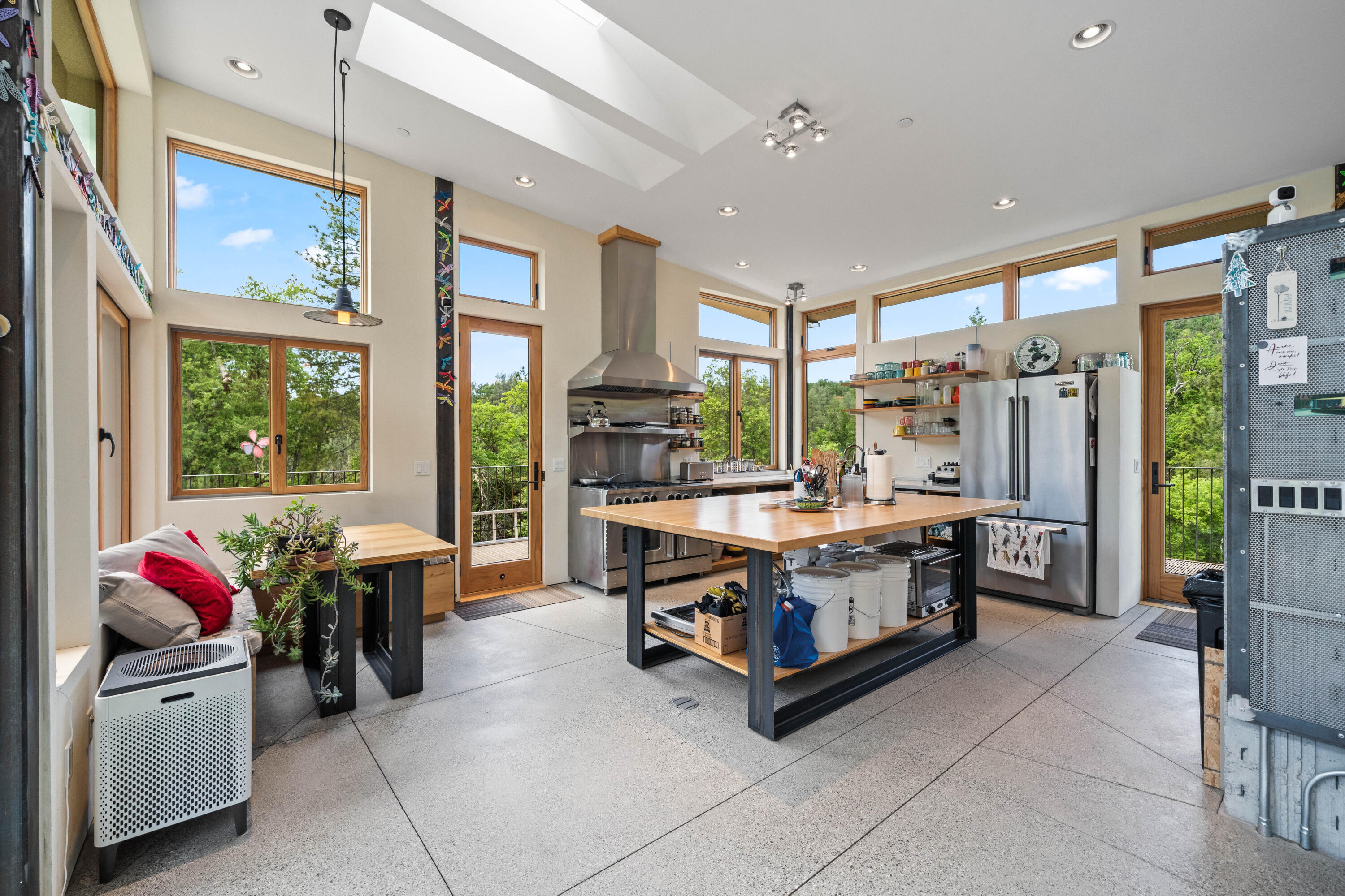 6691 Reading Creek Road Douglas City, CA 96024 - Photo 19 of 125 a large kitchen with stainless steel appliances granite countertop a sink and cabinets