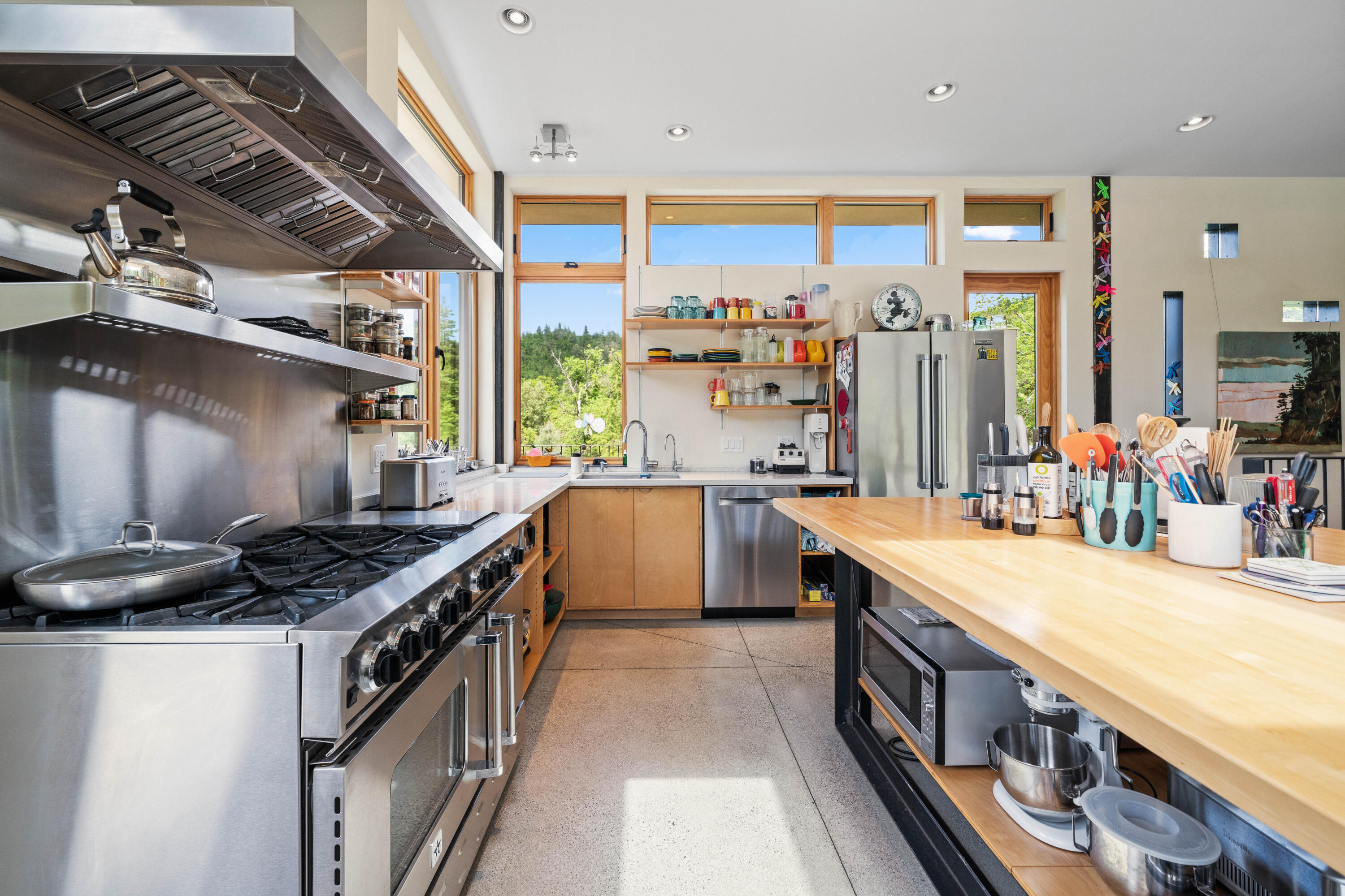 6691 Reading Creek Road Douglas City, CA 96024 - Photo 21 of 125 a kitchen with stainless steel appliances granite countertop a stove and a sink