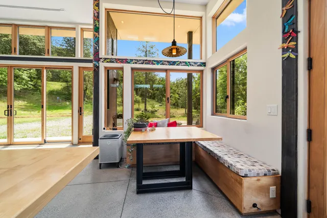 a bedroom with a bed and a view of bathroom