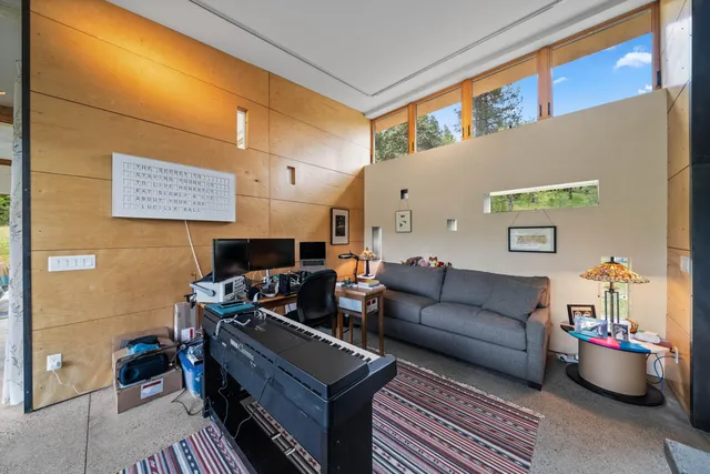 a view of a chairs and table on the wooden floor