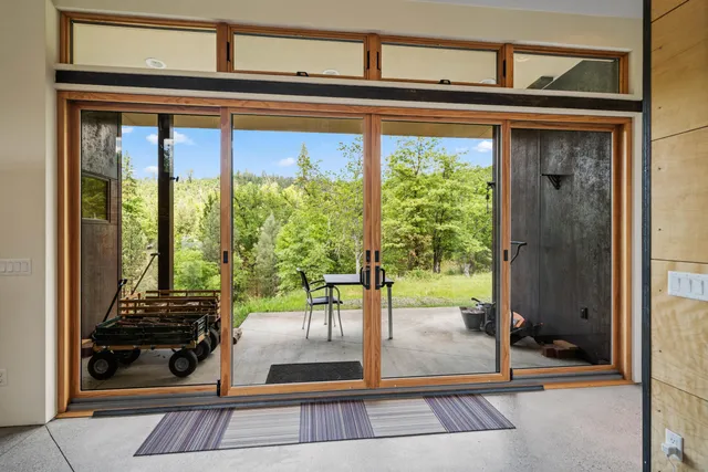 a backyard of a house with lots of green space